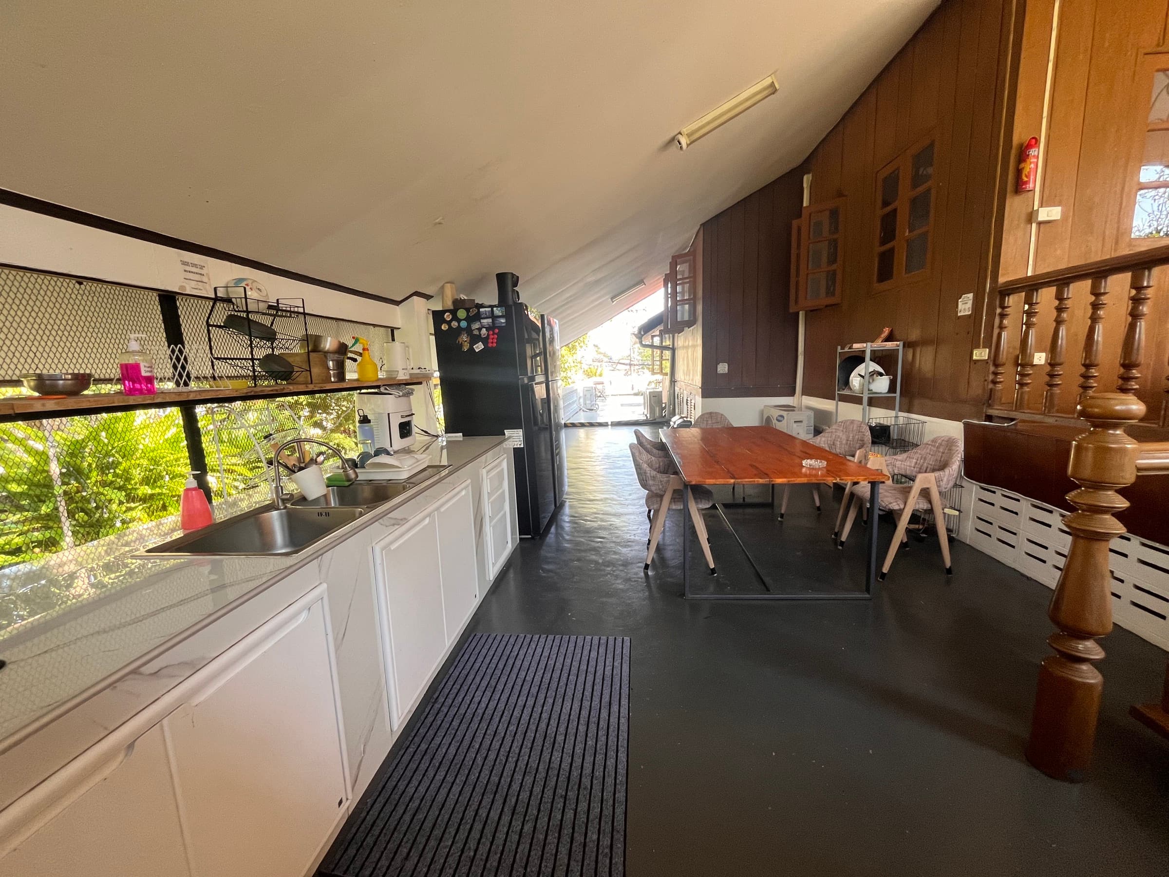Upstairs Thai kitchen with wooden ceiling and counter